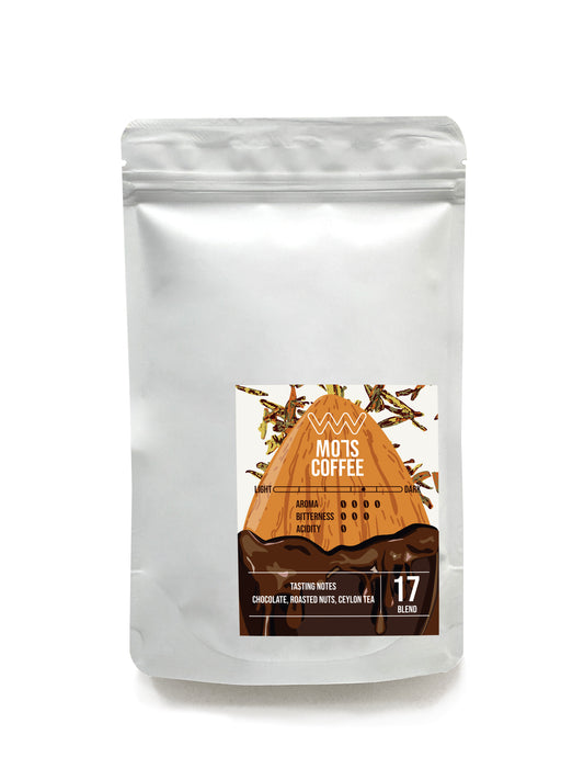 A steaming cup of MO7S No.17 coffee, boasting a medium-bodied richness with layers of chocolate and roasted nuts—hazelnut and almond. A subtle hint of Ceylon tea enhances its sweet, crisp consistency, while delicate floral accents add a refined touch. Each sip delivers a clean and refreshing finish, leaving a lasting sense of satisfaction.