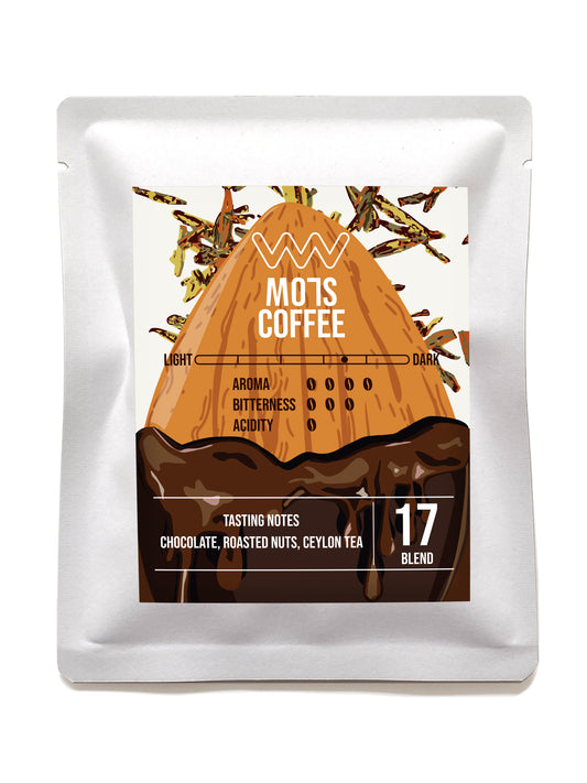 A steaming cup of MO7S No.17 coffee, boasting a medium-bodied richness with layers of chocolate and roasted nuts—hazelnut and almond. A subtle hint of Ceylon tea enhances its sweet, crisp consistency, while delicate floral accents add a refined touch. Each sip delivers a clean and refreshing finish, leaving a lasting sense of satisfaction.