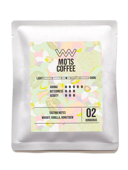 A rich cup of MO7S No.02 coffee with a whisky-forward aroma, vanilla warmth, and honeydew brightness.