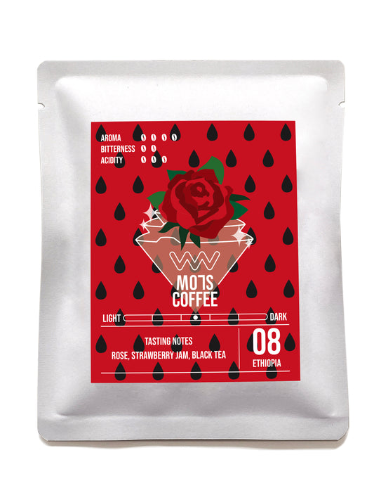 A cup of MO7S No.08 drip bag coffee with bright floral notes, sweet strawberry jam, and a silky mouthfeel.